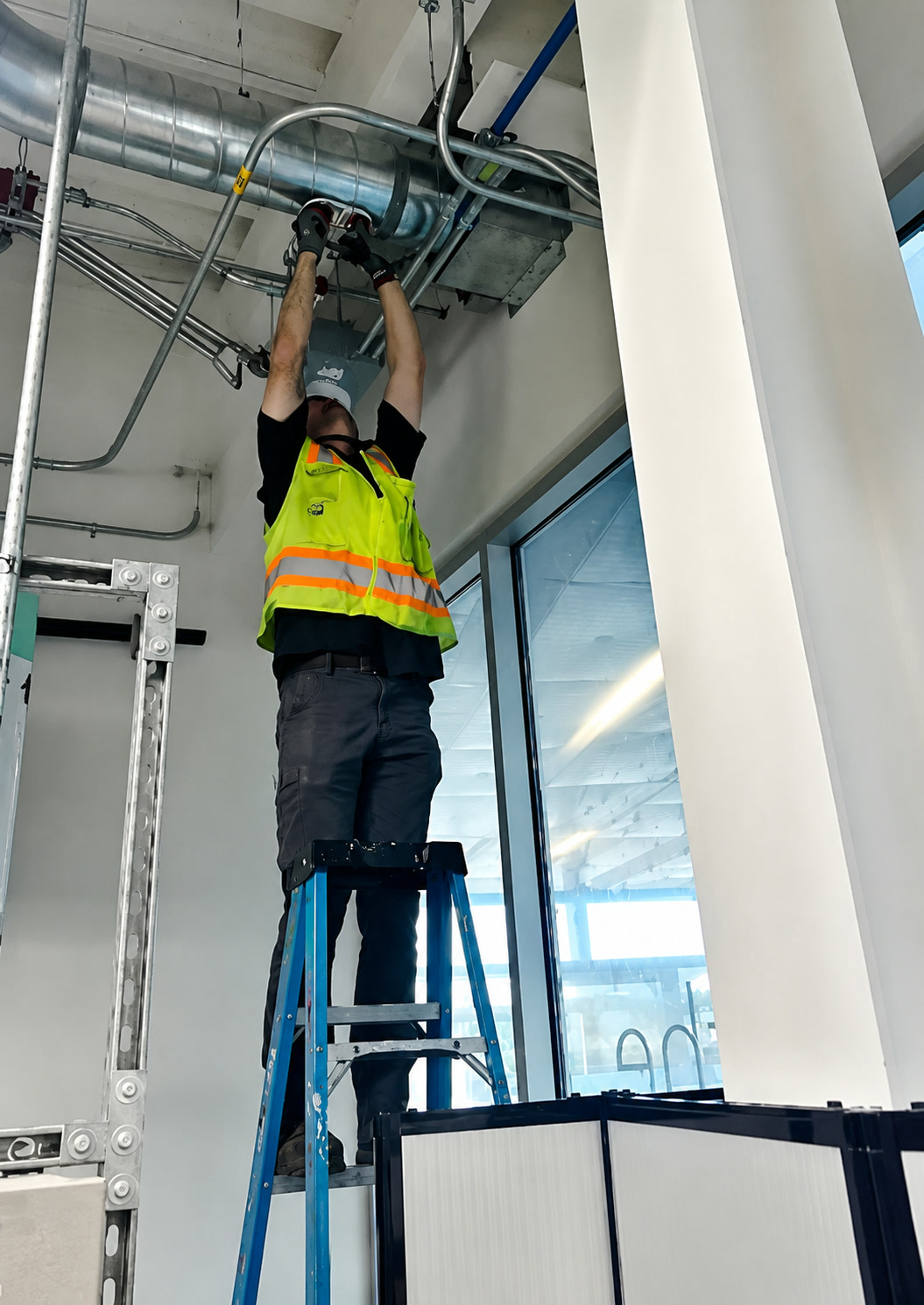 Fire and smoke damper inspection by a TAB Services technician